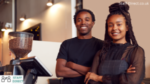 Happy hospitality staff working in a bustling restaurant