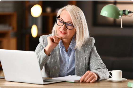 A close-up of a human resources professional in a business meeting, demonstrating strategic workforce management.