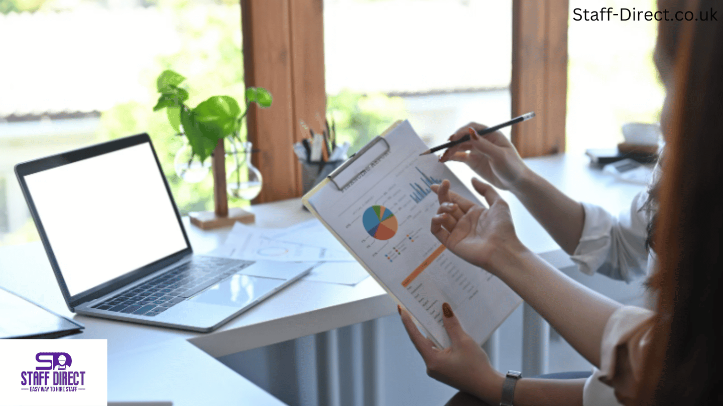 Payroll professional working on financial reports